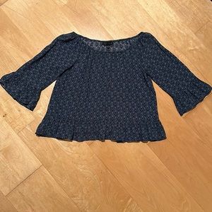 Sanctuary navy blue and white paisley print top.